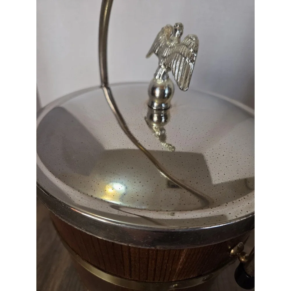 vintage Jerywil wood and brass-accented footed ice bucket from the 1970s
